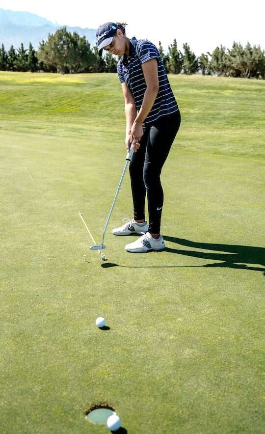 person playing golf
